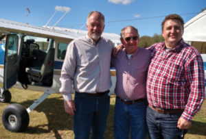 Eric (left) had the opportunity to see missionary planes in action. Pray for more!
