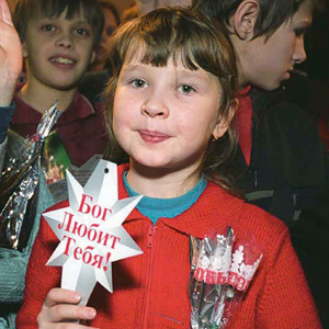 Girl holding ornament