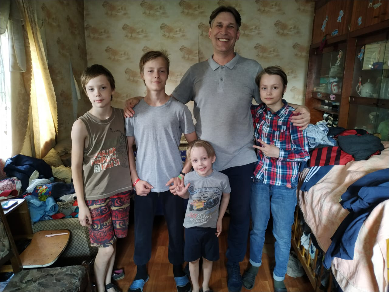 A missionary pastor in Omsk visits a family with four boys.