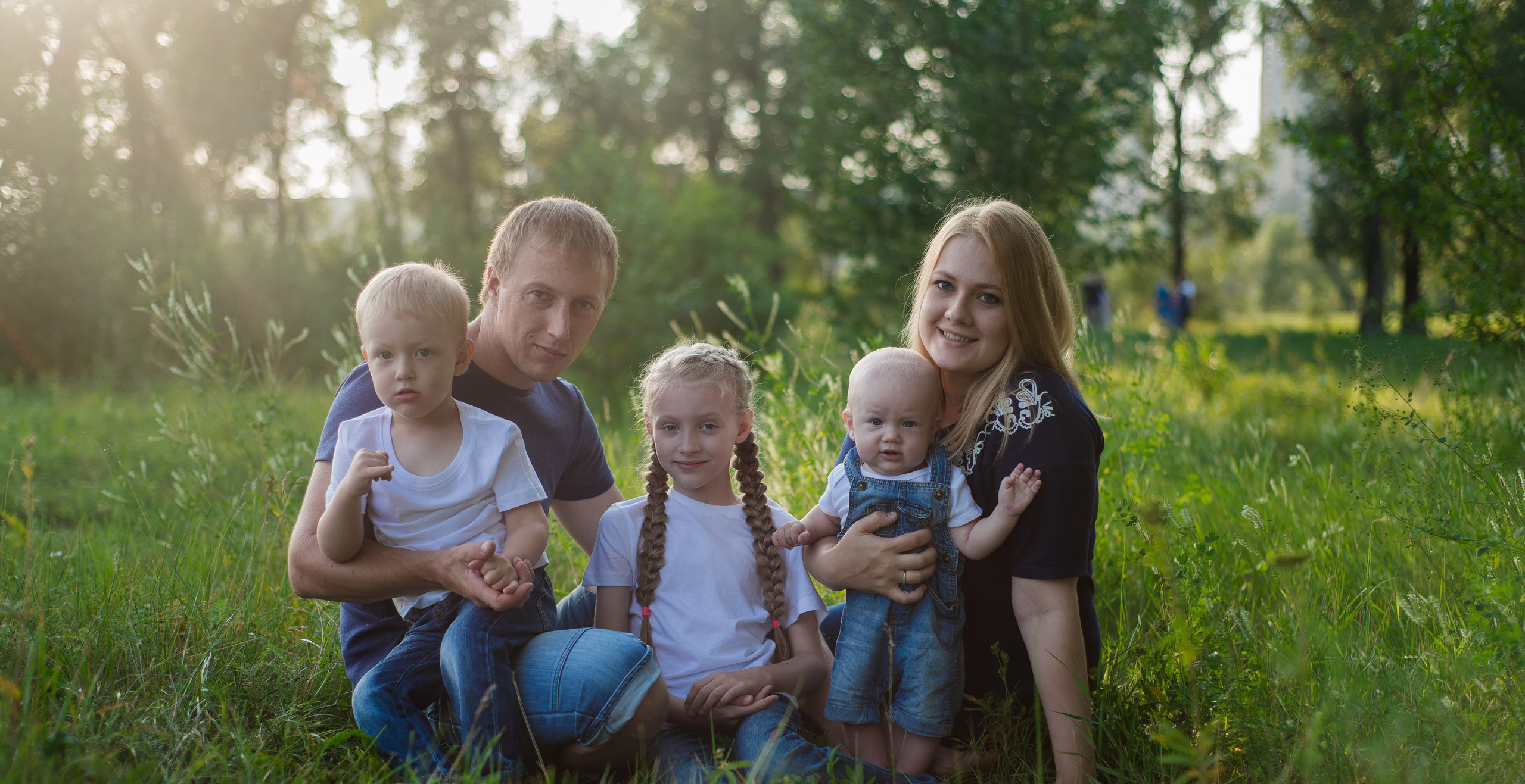 Orphan-graduate Nina and her family.