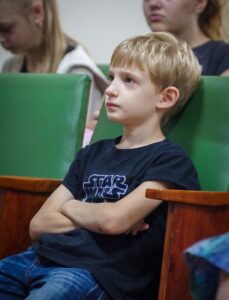 Yura listens during a Bible lesson.