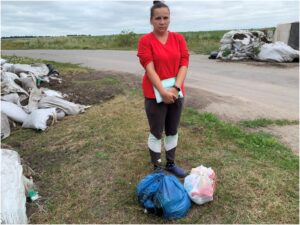 Olena with aid from believers.