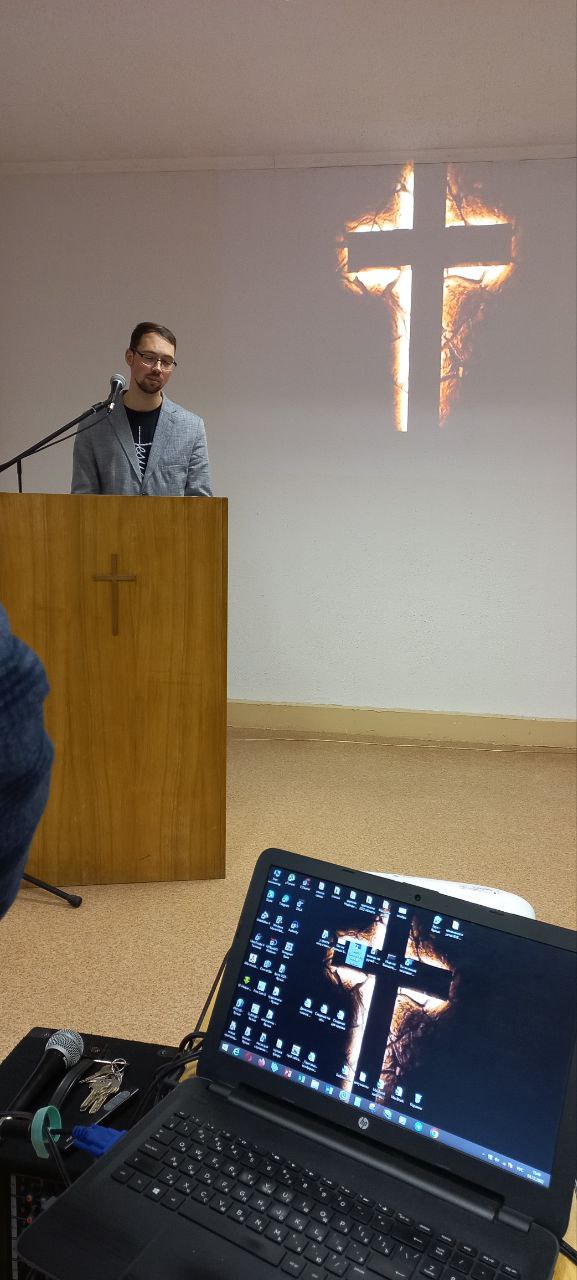 Pastor Yuri's son preaches during the Sunday service.