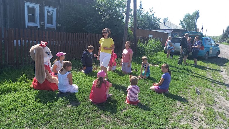 Children play games at a Russian playground.
