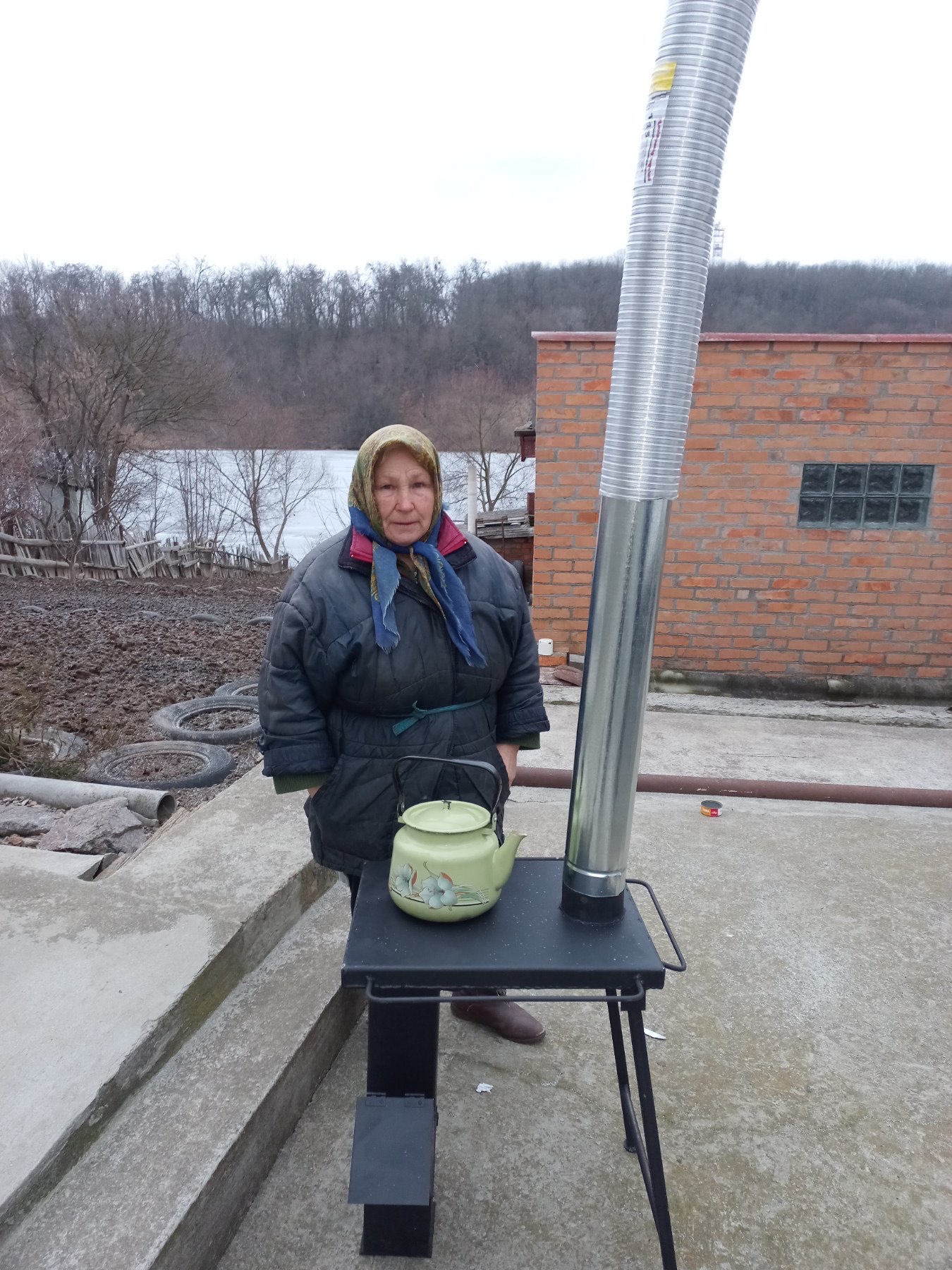 Maria with her stove.