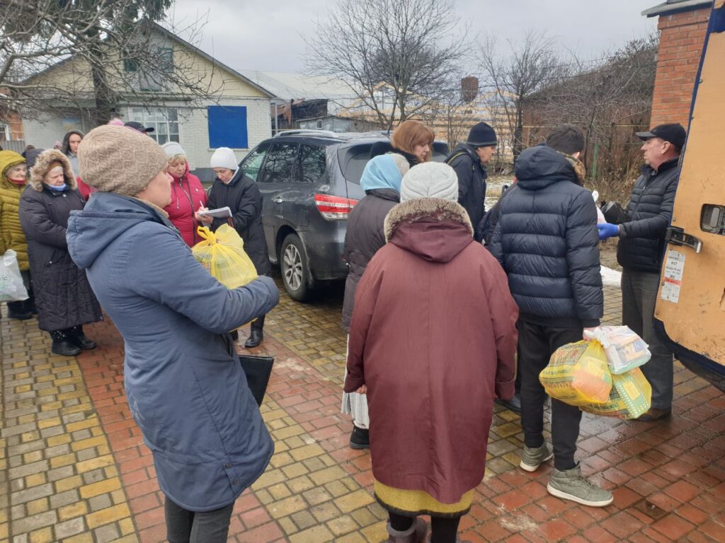 Distributing food aid.