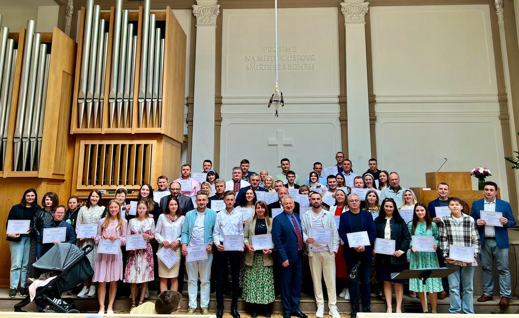 Graduation ceremony for Ukrainian students at an Irpen Biblical Seminary extension center in Prague.