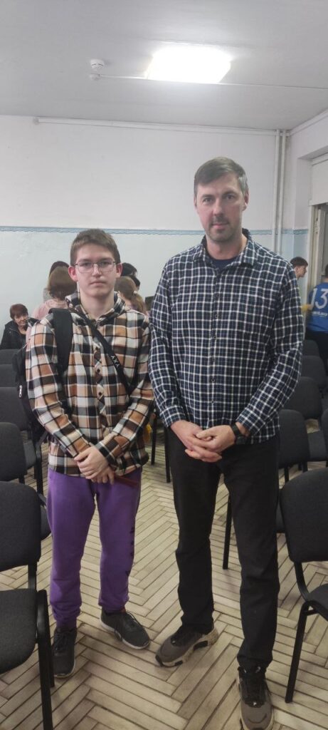 Mathey with an Orphans Reborn leader.