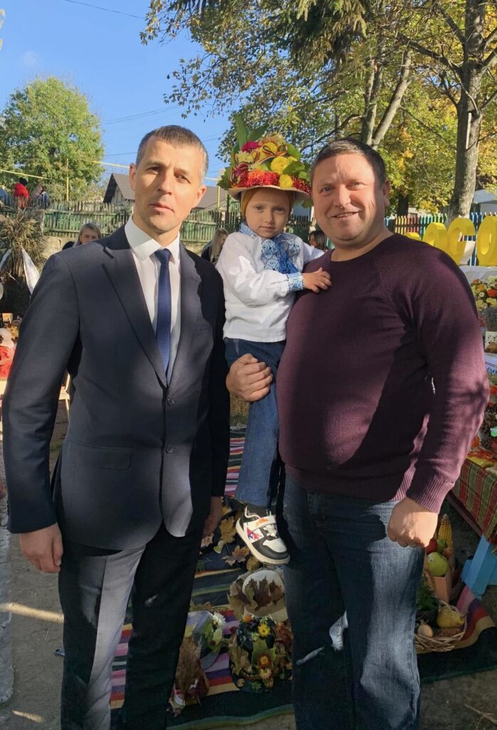 Andrei and a local official.