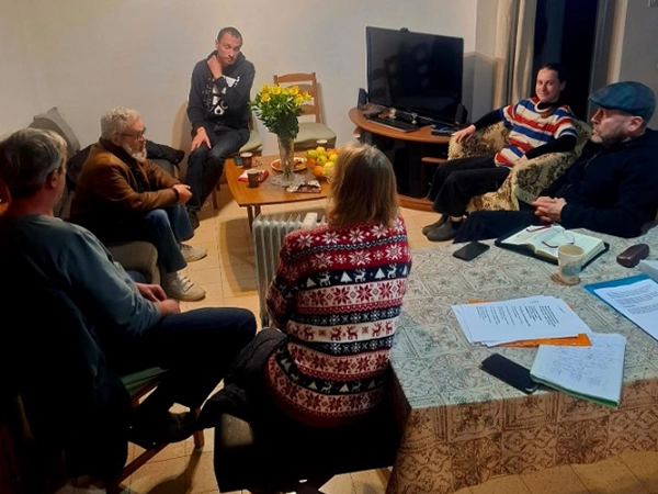 People in a room reflecting on the Messiah’s message