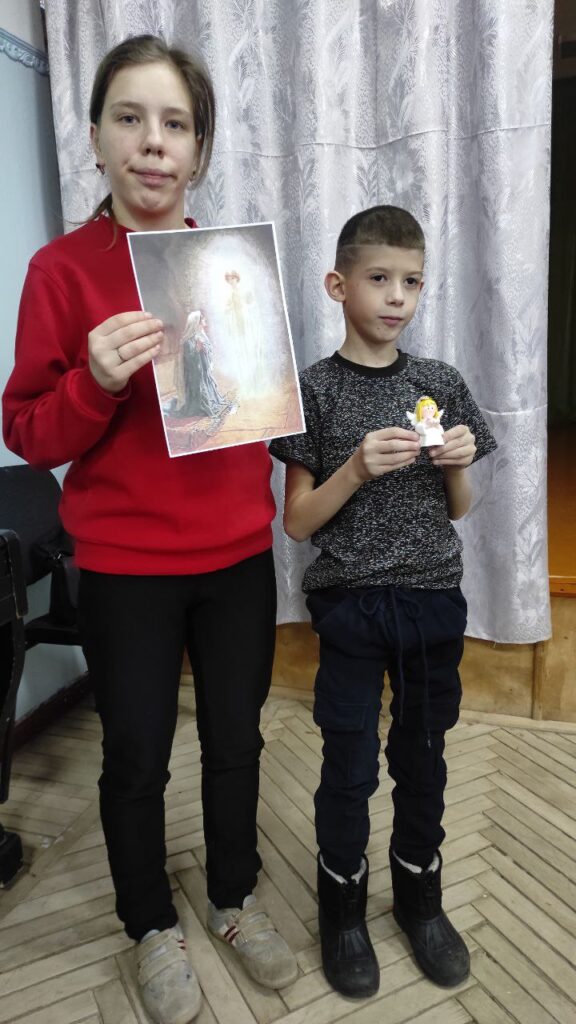 Zhenya (left) with another child at the orphanage.