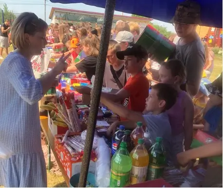 Woman attending a candy stand