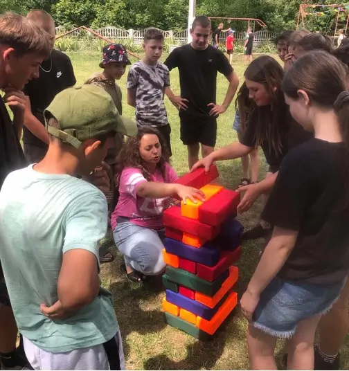 Kids playing giant Jenga
