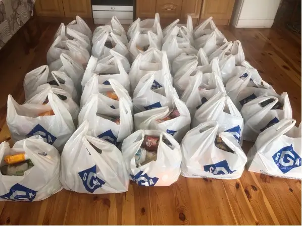 Plastic bags with food and essentials