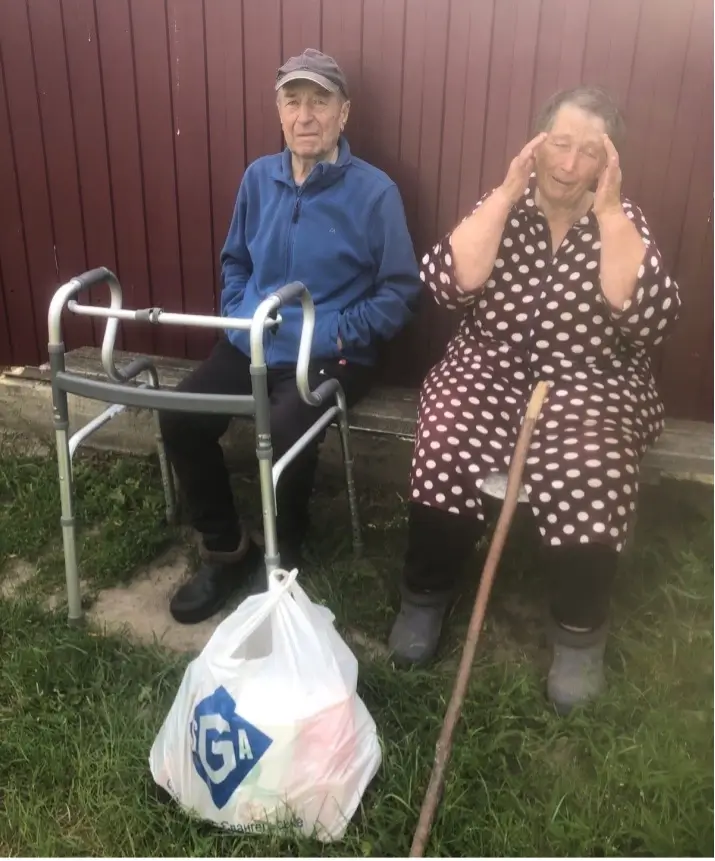 Grandparents with an SGA aid bag